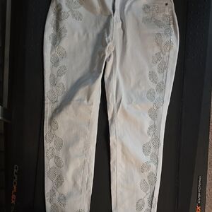 White Jeans with Leaf Embellishments